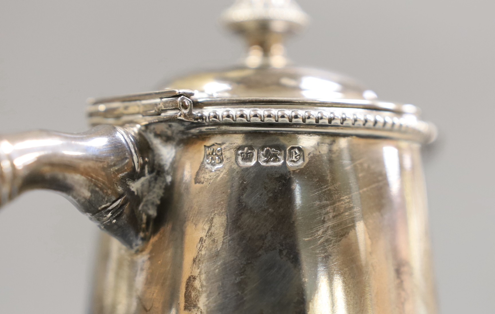 A late Victorian silver mounted cut glass claret jug, Goldsmiths & Silversmiths Co, Sheffield, 1897, height 27cm.
